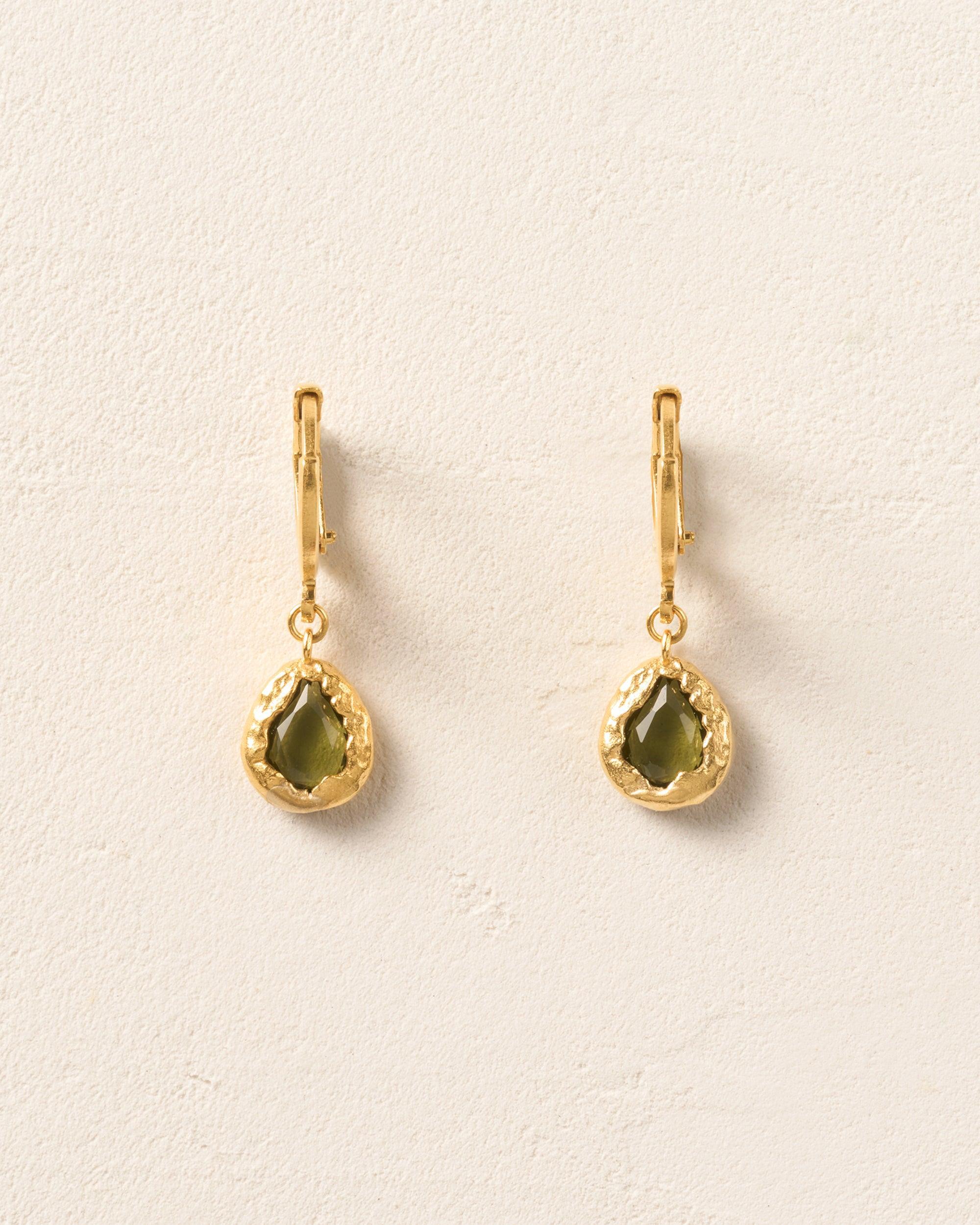 Lysia dark green drop earrings with hand-set stones in textured gold hoops.