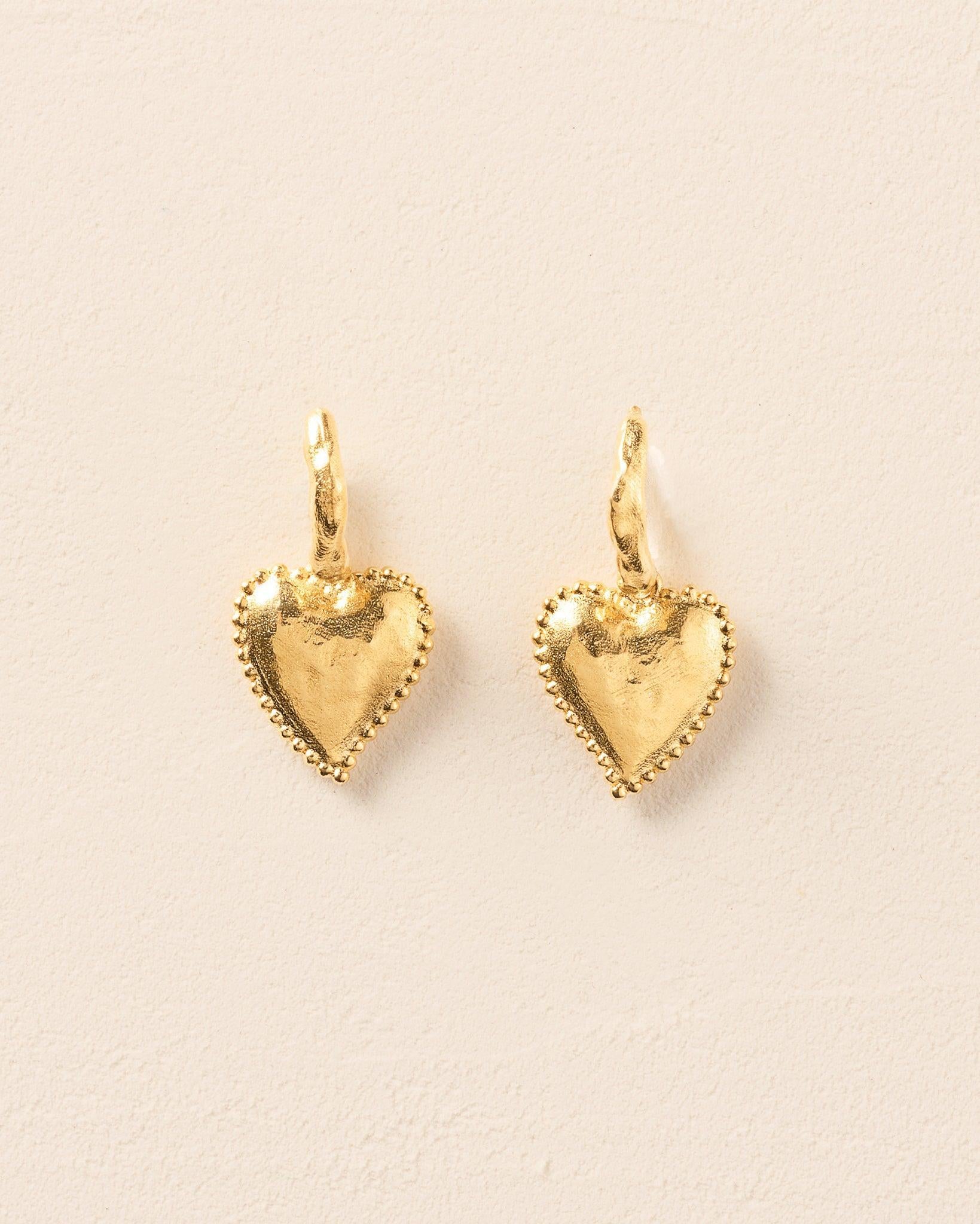 Gold Amori heart hoop earrings with hammered texture and beaded halo.