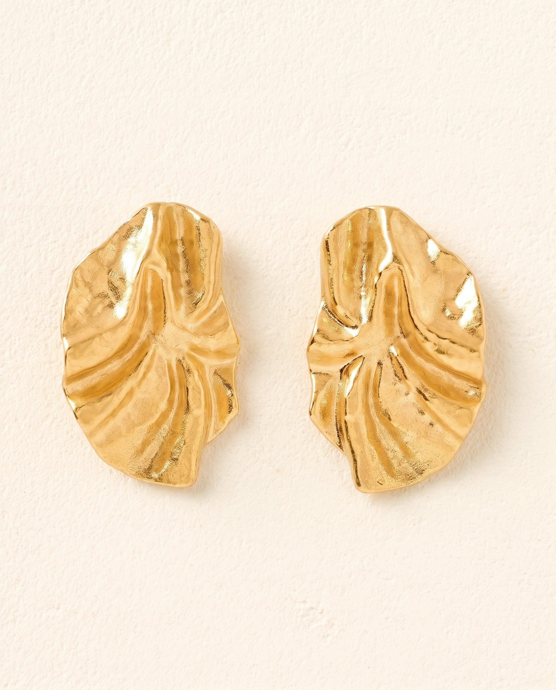 Pair of gold Batla earrings with a unique soft petal, fabric-like texture.